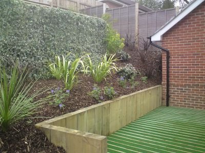 Terraced decking in a development garden at Haslemere