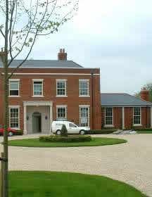 Terraced lawns and landscape planting at West Tytherley, Hampshire